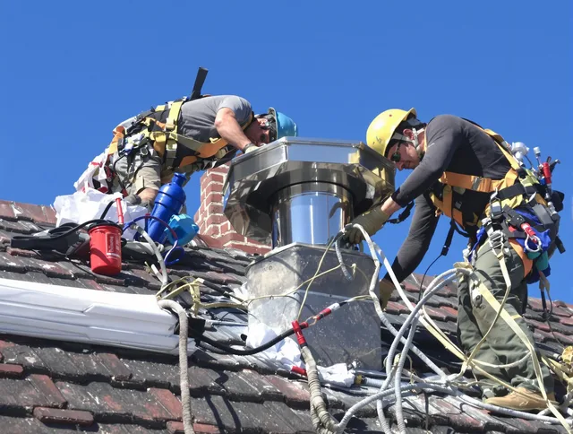 Protective chimney cap installed by Kendall Chimney Sweep in Kendall, FL